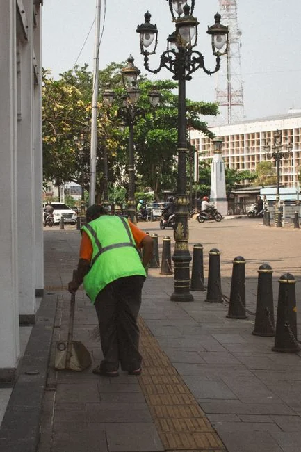 A person in full protective gear fumigating a room to ensure sterilization against viruses.